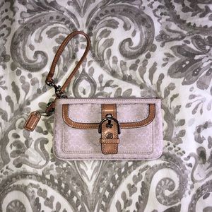 COACH... hand clutch